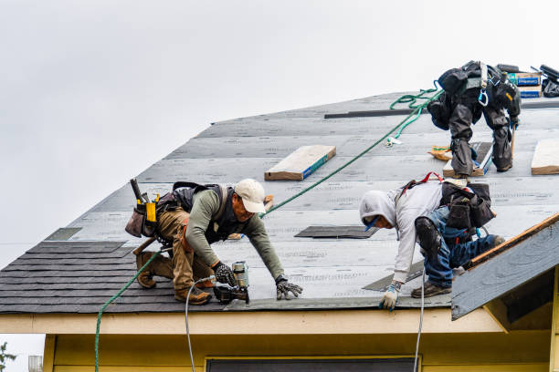 Professional Roof Replacement technician working in Mechanic Falls, ME